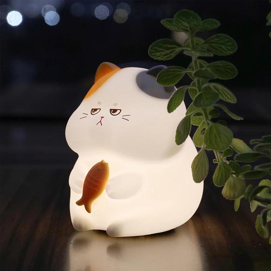 Squishy Greedy Cat Night Light – Soft Silicone Lamp by Nighli.