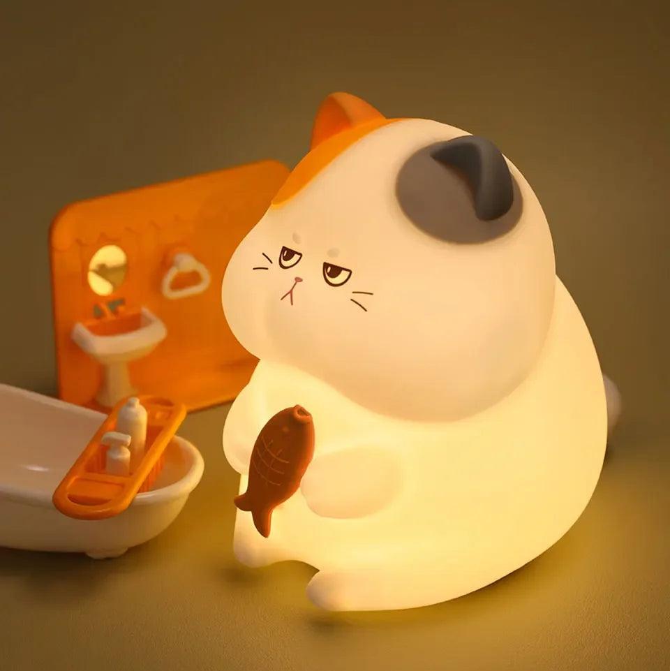 Squishy Greedy Cat Night Light – Soft Silicone Lamp by Nighli.