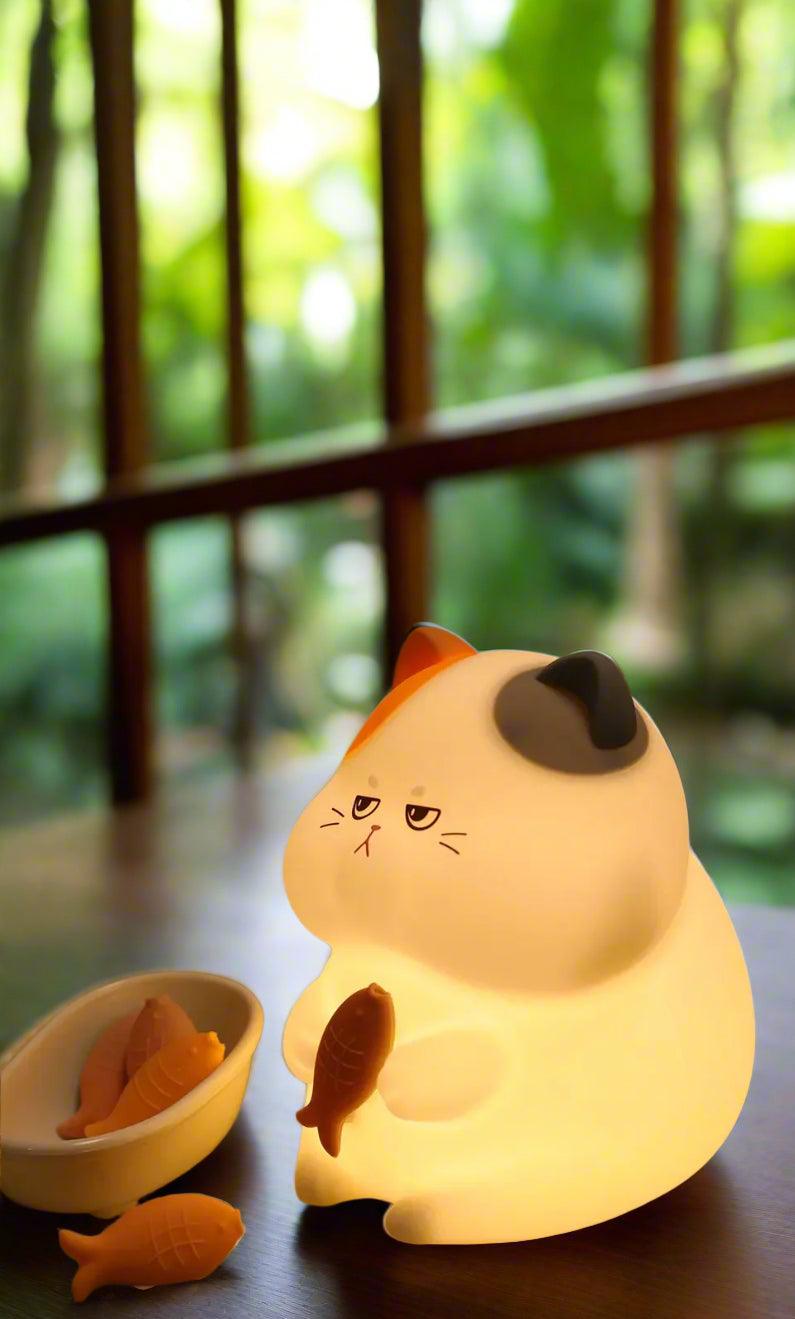 Squishy Greedy Cat Night Light – Soft Silicone Lamp by Nighli.