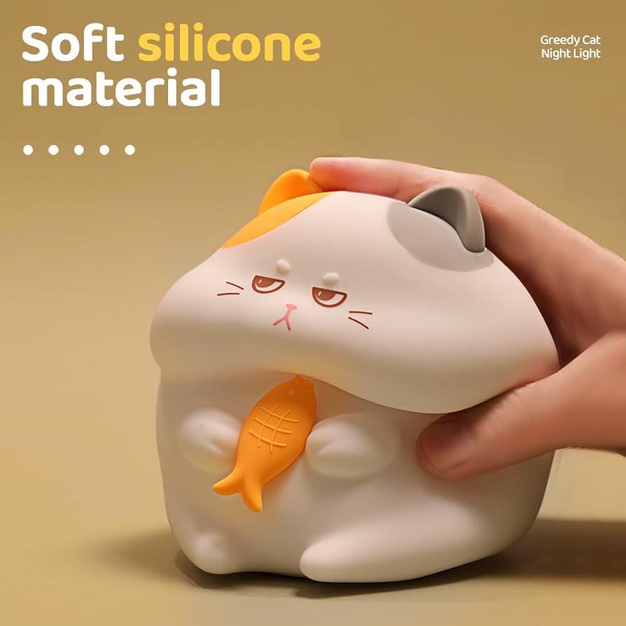 Squishy Greedy Cat Night Light – Soft Silicone Lamp by Nighli.